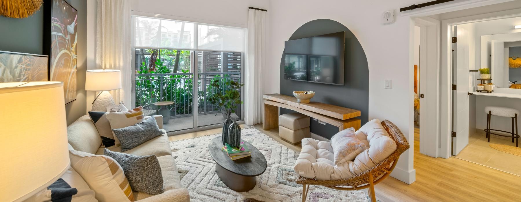 a living room with a media area