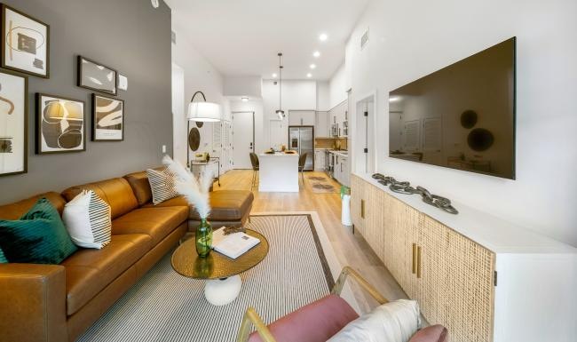 a living room with a couch and a table